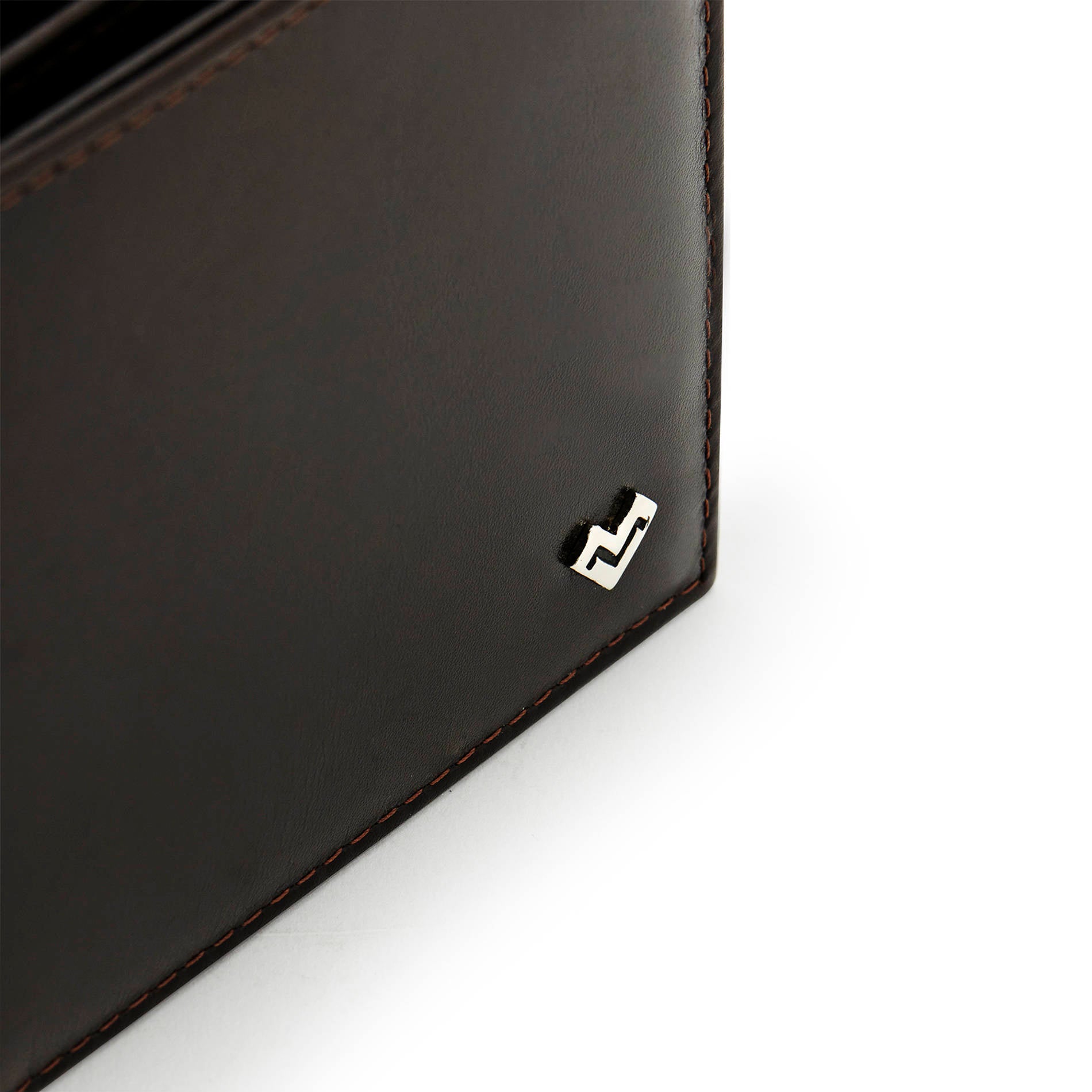 Detail of Mario Valentino dark brown Italian embossed calfskin leather wallet with metal MV logo and smooth finish.