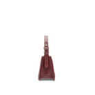 Side view of a burgundy leather handbag with smooth finish and refined curved top edge. Made in Italy.