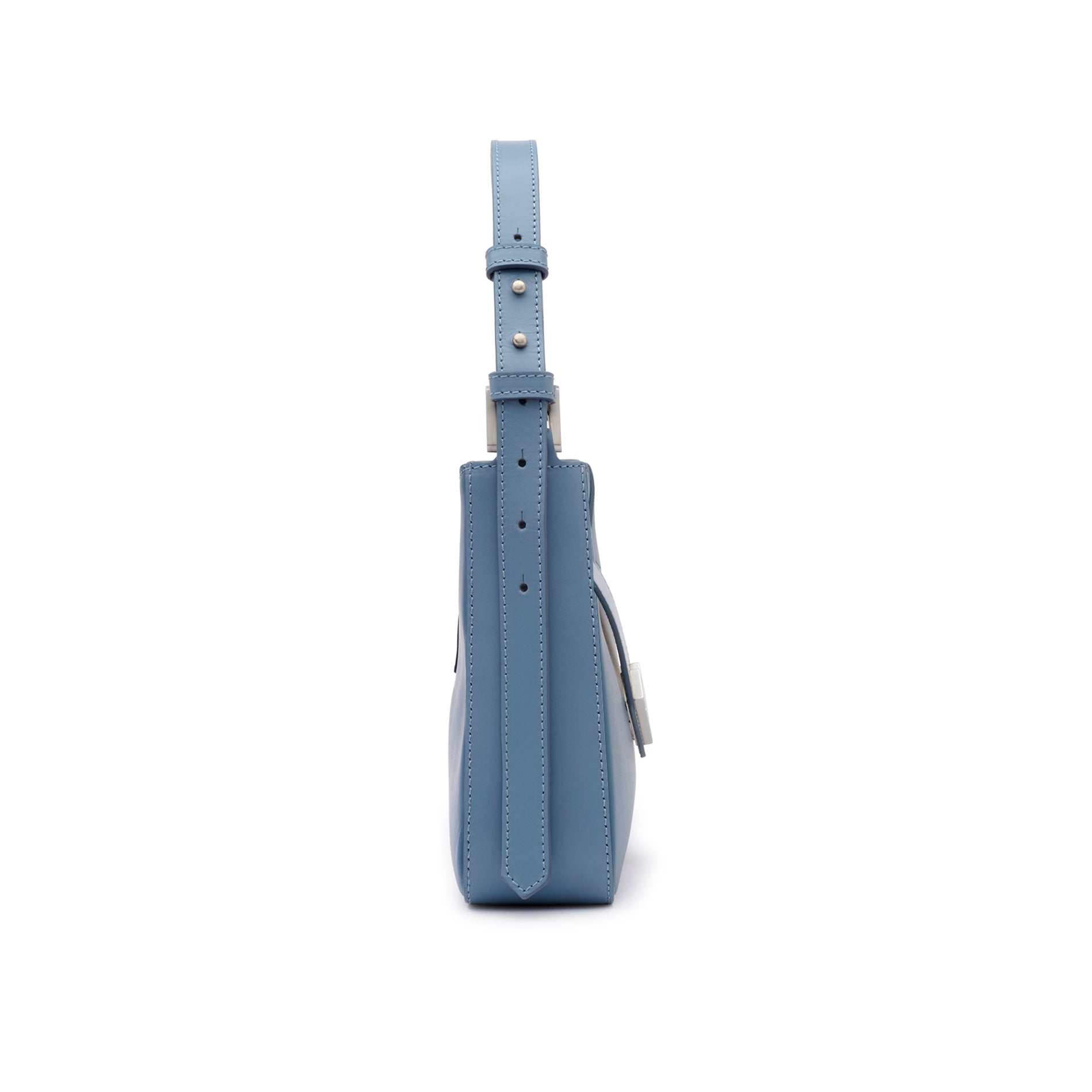 Side profile view of the Mario Valentino sky blue leather shoulder bag, showcasing its architectural shape and polished silver-finish hardware attachment