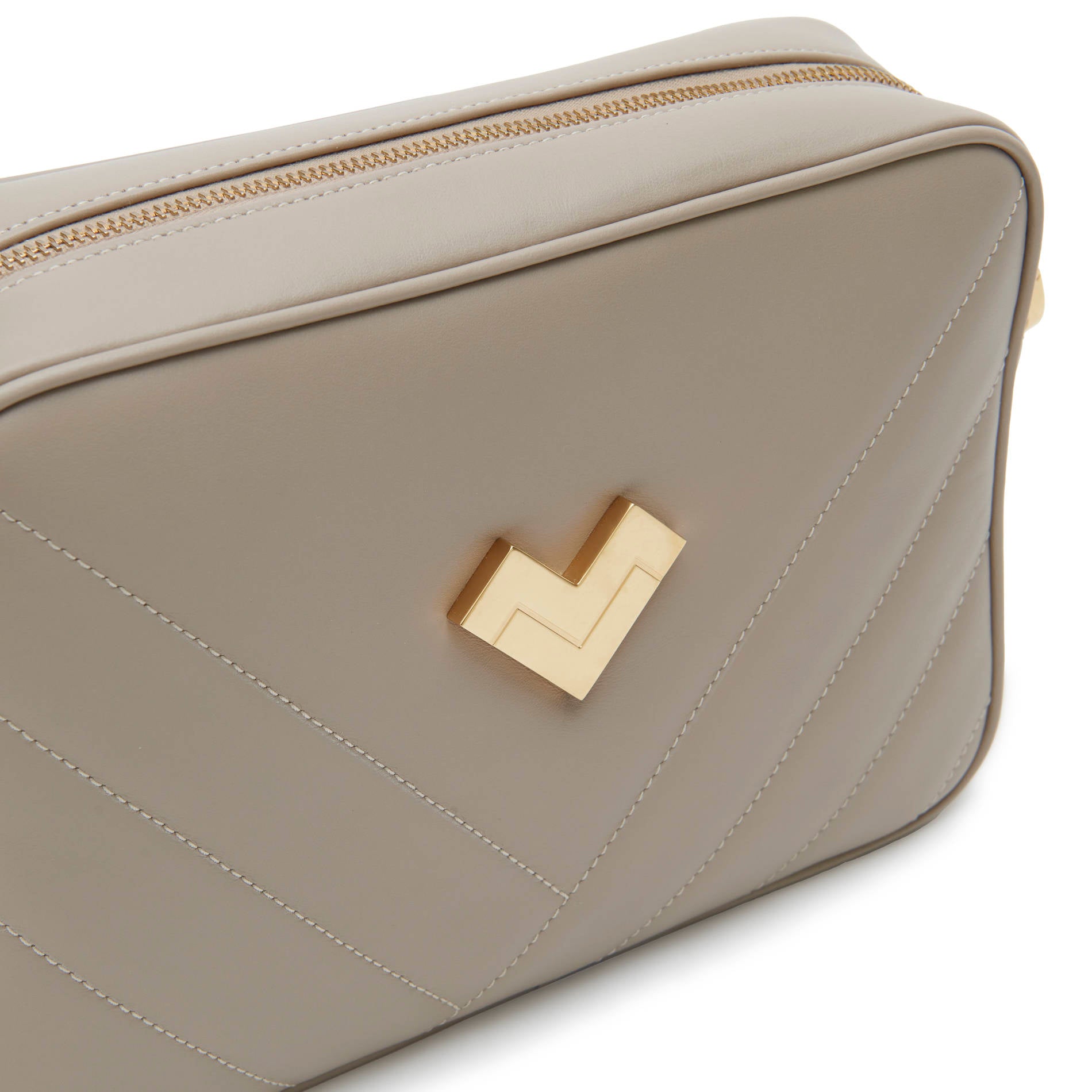 Brown quilted leather crossbody camera bag with gold logo and chevron stitching detail. Made in Italy