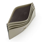 Interior view of Mario Valentino grey leather card holder with card slots and central pocket.