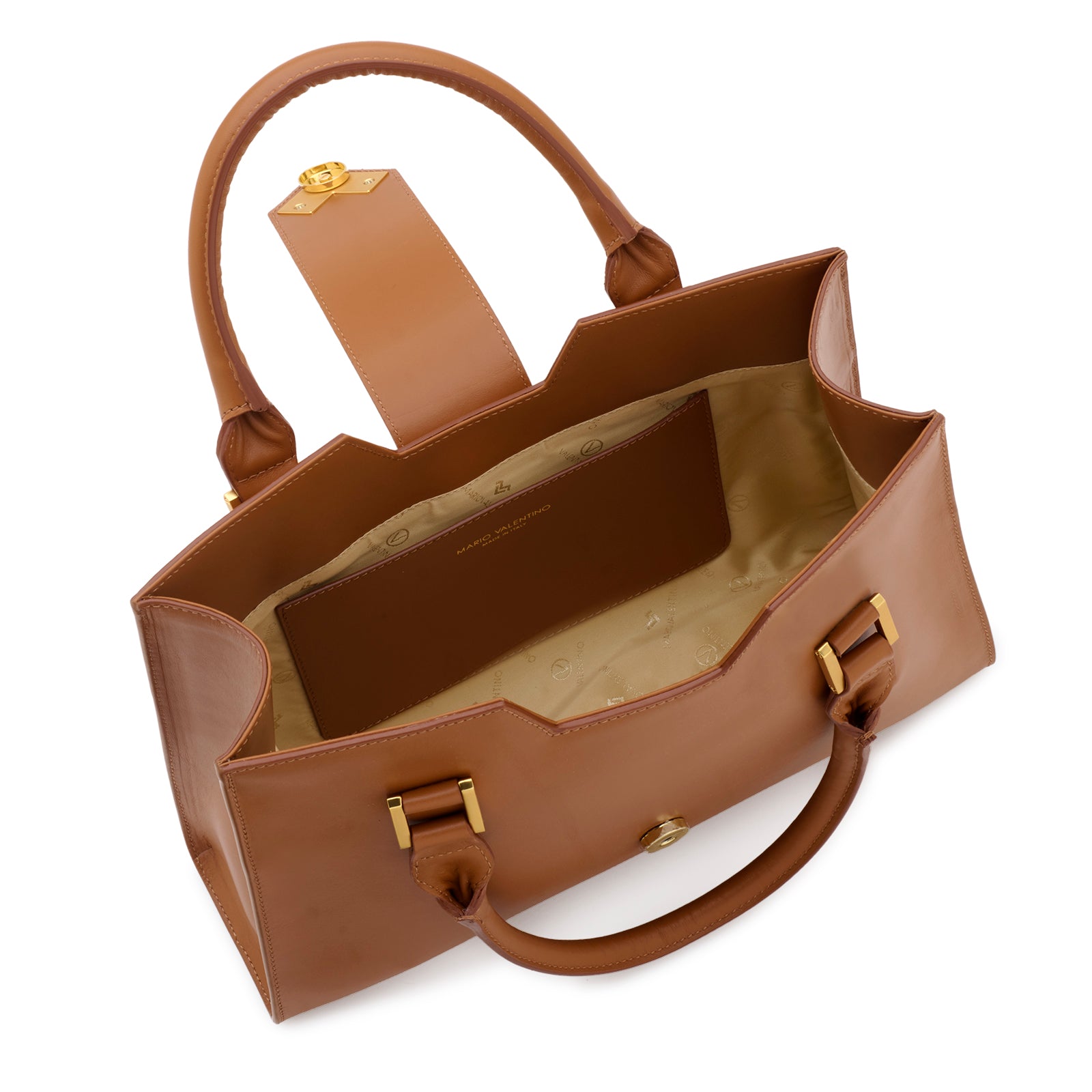 Open interior of Mario Valentino brown handbag showing logoed nylon lining and inner pocket.