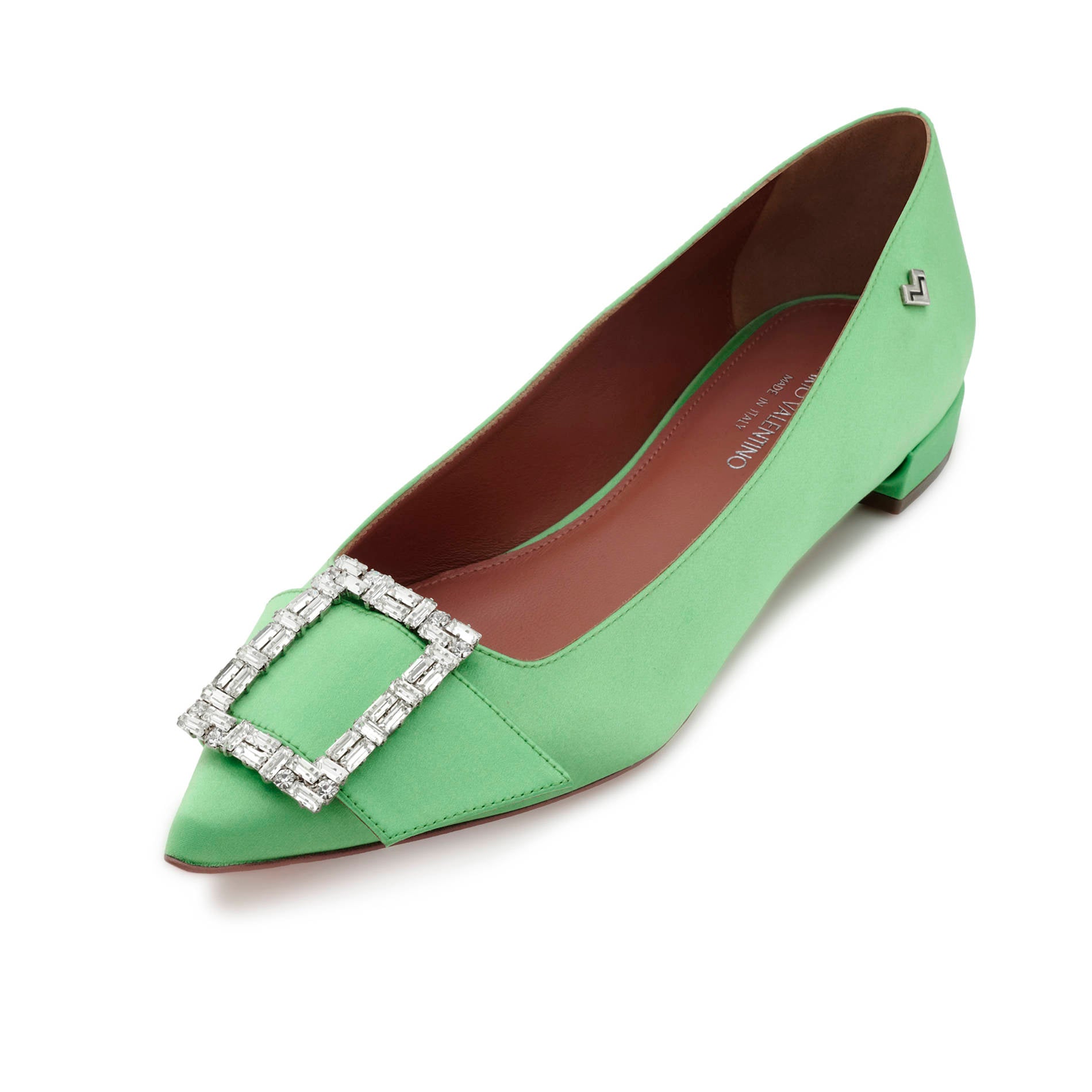 Detail of pointed toe lime satin flats with crystal buckle embellishment