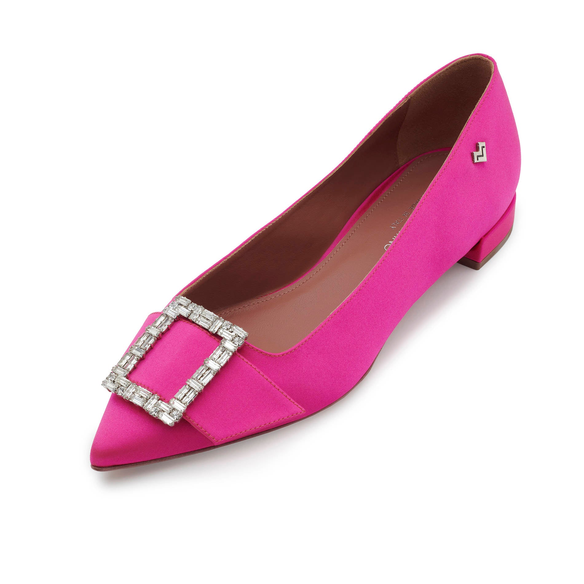 Detail of pointed toe Shocking pink satin flats with crystal buckle embellishment