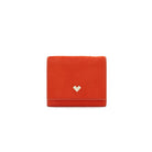 Mario Valentino small red calf hair leather compact wallet with flap and snap button closure, metal MV logo and textured finish. Made in Italy.