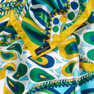 Luxury silk foulard by Mario Valentino with abstract motifs in vibrant tones, soft and fluid pure silk square scarf