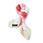 Pure silk foulard defined by a soft floral print. Lightweight, fluid and naturally elegant.