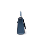 Side profile of the Mario Valentino light blue leather bag showing the structured silhouette and silver-tone attachments.