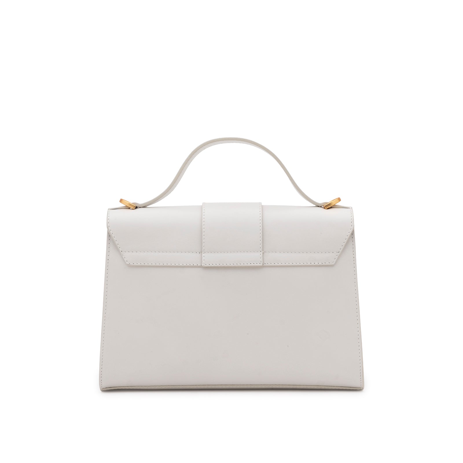 Rear view of the Mario Valentino white leather top-handle bag highlighting the clean finish and tonal stitching.