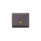 Mario Valentino small grey calf hair leather compact wallet with flap and snap button closure, metal MV logo and textured finish. Made in Italy.